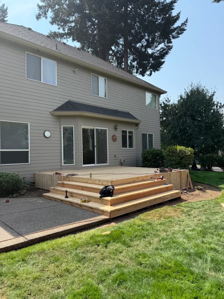 New wood deck built behind an Oregon home